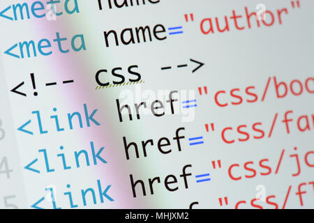 Real Html code developing screen. Programing workflow abstract algorithm concept. Lines of Html code visible. Stock Photo
