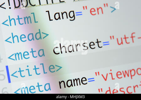 Real Html code developing screen. Programing workflow abstract algorithm concept. Lines of Html code visible. Stock Photo