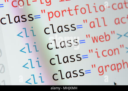 Real Html code developing screen. Programing workflow abstract algorithm concept. Lines of Html code visible. Stock Photo