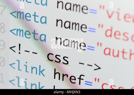 Real Html code developing screen. Programing workflow abstract algorithm concept. Lines of Html code visible. Stock Photo