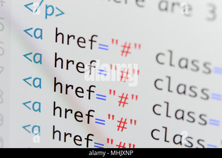 Real Html code developing screen. Programing workflow abstract algorithm concept. Lines of Html code visible. Stock Photo