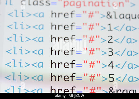 Real Html code developing screen. Programing workflow abstract algorithm concept. Lines of Html code visible. Stock Photo