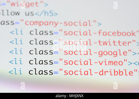 Real Html code developing screen. Programing workflow abstract algorithm concept. Lines of Html code visible. Stock Photo
