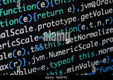 Real Java Script code developing screen. Programing workflow abstract algorithm concept. Closeup of Java Script and HTML code. Stock Photo