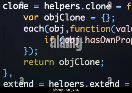 Real Java Script code developing screen. Programing workflow abstract algorithm concept. Closeup of Java Script and HTML code. Stock Photo