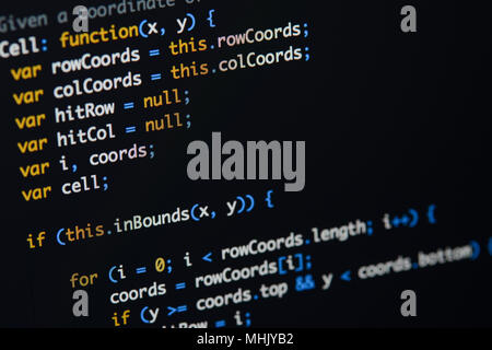Real Java Script code developing screen. Programing workflow abstract algorithm concept. Closeup of Java Script and HTML code. Stock Photo