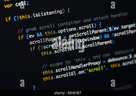 Real Java Script code developing screen. Programing workflow abstract algorithm concept. Closeup of Java Script and HTML code. Stock Photo