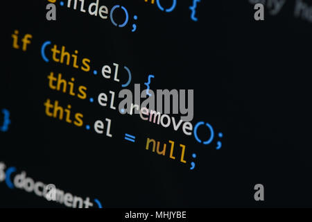 Real Java Script code developing screen. Programing workflow abstract algorithm concept. Closeup of Java Script and HTML code. Stock Photo