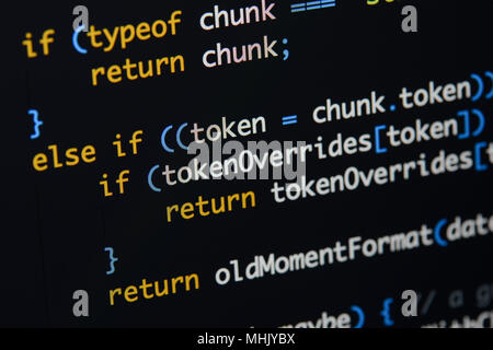 Real Java Script code developing screen. Programing workflow abstract algorithm concept. Closeup of Java Script and HTML code. Stock Photo