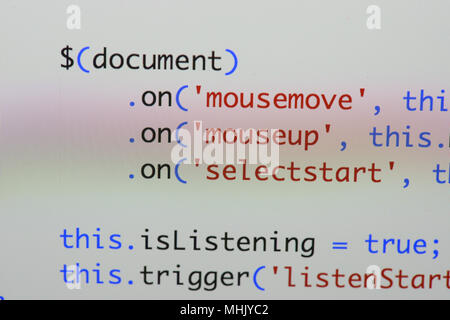Real Java Script code developing screen. Programing workflow abstract algorithm concept. Closeup of Java Script and HTML code. Stock Photo