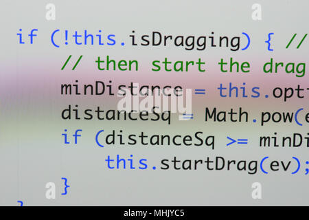Real Java Script code developing screen. Programing workflow abstract algorithm concept. Closeup of Java Script and HTML code. Stock Photo