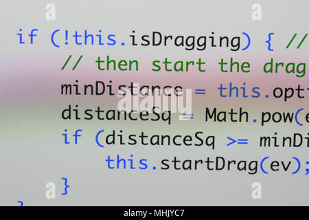 Real Java Script code developing screen. Programing workflow abstract algorithm concept. Closeup of Java Script and HTML code. Stock Photo