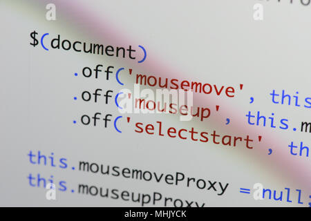 Real Java Script code developing screen. Programing workflow abstract algorithm concept. Closeup of Java Script and HTML code. Stock Photo