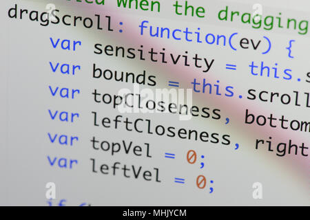 Real Java Script code developing screen. Programing workflow abstract algorithm concept. Closeup of Java Script and HTML code. Stock Photo