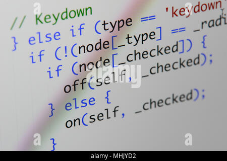 Real Java Script code developing screen. Programing workflow abstract algorithm concept. Closeup of Java Script and HTML code. Stock Photo
