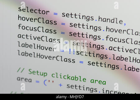 Real Java Script code developing screen. Programing workflow abstract algorithm concept. Closeup of Java Script and HTML code. Stock Photo