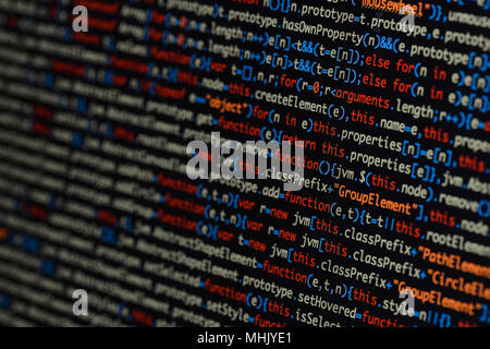 Real Java Script code developing screen. Programing workflow abstract algorithm concept. Closeup of Java Script and HTML code. Stock Photo