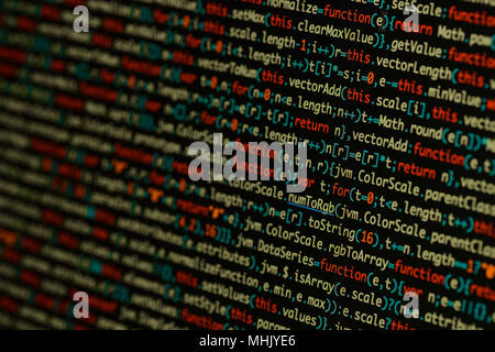 Real Java Script code developing screen. Programing workflow abstract algorithm concept. Closeup of Java Script and HTML code. Stock Photo