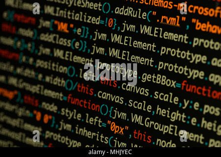 Real Java Script code developing screen. Programing workflow abstract algorithm concept. Closeup of Java Script and HTML code. Stock Photo