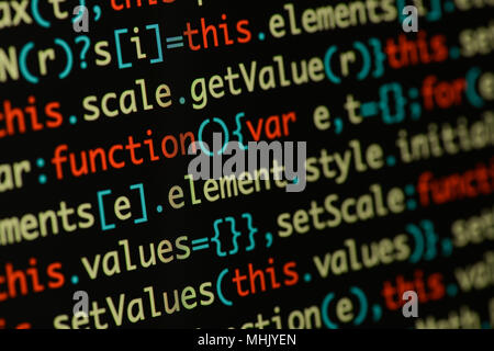 Real Java Script code developing screen. Programing workflow abstract algorithm concept. Closeup of Java Script and HTML code. Stock Photo