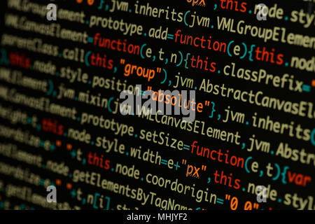 Real Java Script code developing screen. Programing workflow abstract algorithm concept. Closeup of Java Script and HTML code. Stock Photo