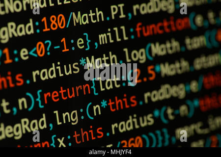 Real Java Script code developing screen. Programing workflow abstract algorithm concept. Closeup of Java Script and HTML code. Stock Photo