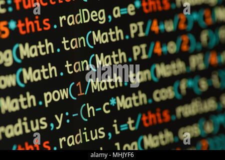 Real Java Script code developing screen. Programing workflow abstract algorithm concept. Closeup of Java Script and HTML code. Stock Photo