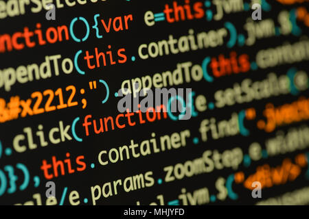 Real Java Script code developing screen. Programing workflow abstract algorithm concept. Closeup of Java Script and HTML code. Stock Photo