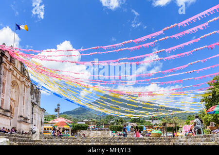 San Juan del Obispo, Guatemala - June 26, 2016: Local women sell street food outside church on slopes of Agua volcano during St John's Day celebration Stock Photo