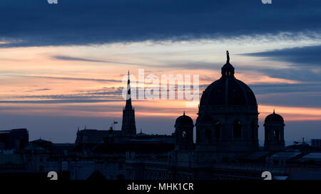 Sunrise over St. Stephen's Cathedral, left, and the Kunsthistorisches Museum Wien, Innere Stadt Vienna, Austria. Stock Photo