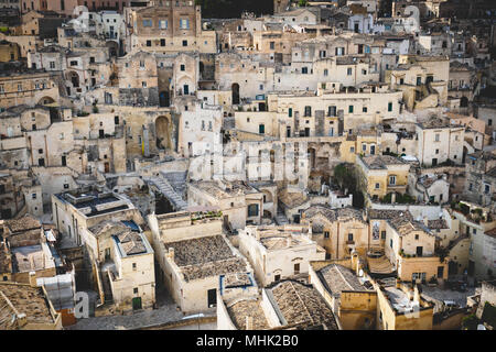 Matera (Italy), September 2017. Panoramic view of the Sasso Barisano from the Square of the Cathedral. Landscape format. Stock Photo