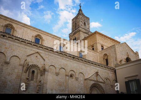 Matera (italy), September 2017. View of the lateral facade of the Cathedral dedicated to the Virgin Mary and Saint Eustace with the bell tower. Stock Photo