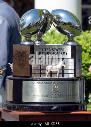 Washington, USA. 1st May 2018. The Commander-in-Chief's Trophy is displayed prior to the arrival of United States President Donald J. Trump, k who will present it to the Military Academy football team in the Rose Garden of the White House in Washington, DC on Tuesday, May 1, 2018. The Commander-in-Chief's trophy is presented to the winner of the annual Army-Navy football game which was played at Lincoln Financial Field in Philadelphia, Pennsylvania on December 9, 2017.dMedia Credit: Newscom/Alamy Live News Credit: Newscom/Alamy Live News