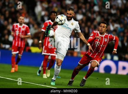 Madrid, Spain. 1st May, 2018. Real Madrid's Karim Benzema (Front) competes during a UEFA Champions League semifinal second leg soccer match between?Spanish team Real Madrid and German team Bayern Munchen in Madrid, Spain, on May 1, 2018. The match ended 2-2. Real Madrid advanced to the final with 4-3 on aggregate. Credit: Guo Qiuda/Xinhua/Alamy Live News Stock Photo