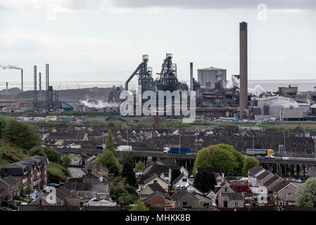 2nd May, 2018. Port Talbot, Wales, UK. Port Talbot in South Wales has the highest levles of air polliution of any town in the UK according to a new report by the World Health Organisation (WHO). Levels of the finest and possibly the most deadly PM2.5 particulates exceeded those of cities such as London with 18 micrograms per cubic metre. Another steel town, Scunthorpe , was second.  Port Talbot has a long history and reputation for having polluted air - it is home to the Tata steelworks and the M4 motorway passes right through on a raised section.   Picture Credit: IAN HOMER/Alamy Live News Stock Photo