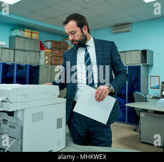 office worker scans documents Stock Photo