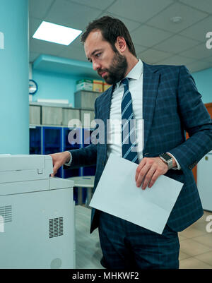 office worker scans documents Stock Photo