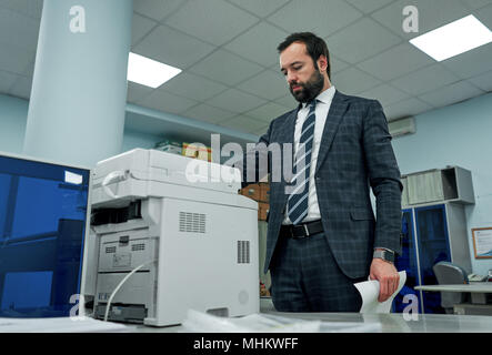 office worker scans documents Stock Photo