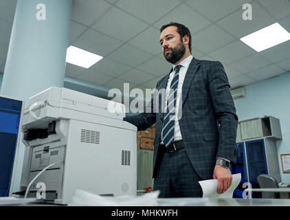 office worker scans documents Stock Photo