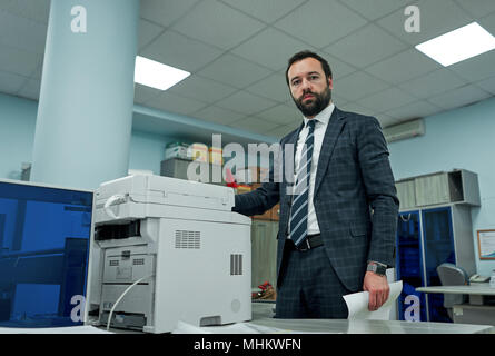 office worker scans documents Stock Photo