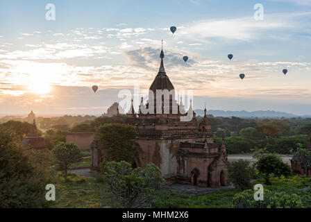 Hot-air balloons and temples at sunrise, Bagan, Myanmar (Burma) Stock Photo