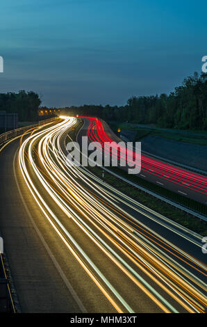 Colorful light trails of busy highway traffic on night, A1 Highway, Gliwice, Silesian Upland, Poland. Stock Photo