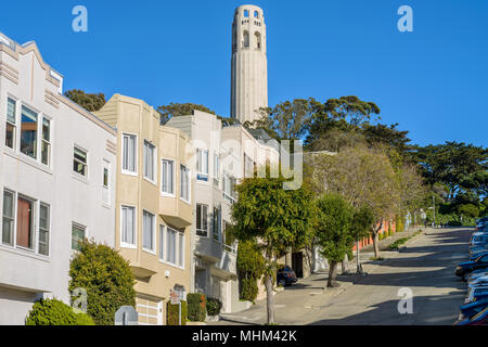 Coit Tower - A close-up view of Coit Tower in Telegraph Hill neighborhood, as seen from steep Filbert Street, San Francisco, California, USA. Stock Photo