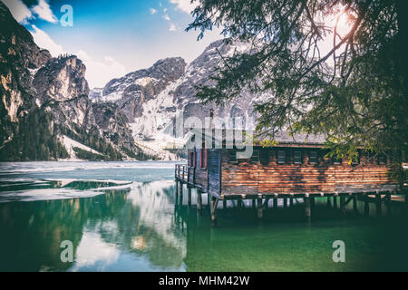 partial freeze braies lake on italian alps Stock Photo