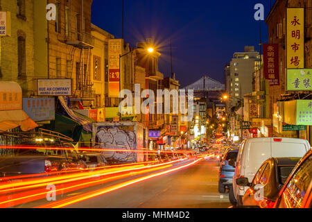 Chinatown at Night - A night view of a busy street in Chinatown of San Francisco, California, USA. Stock Photo