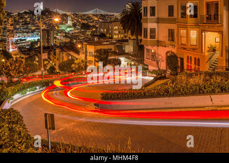 Lombard Street at Night - A night view of Lombard Street, the steepest and crookedest street, in Russian Hill neighborhood of San Francisco, CA, USA. Stock Photo