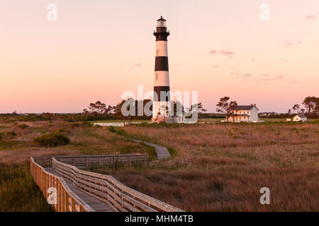 NC01656-00...NORTH CAROLINA - Sunrise at Bodie Island Lighthouse on Bodie Island along the Outer Banks, Cape Hatteras National Seashore. Stock Photo