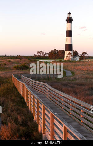 NC01657-00...NORTH CAROLINA - Sunrise at Bodie Island Lighthouse on Bodie Island along the Outer Banks, Cape Hatteras National Seashore. Stock Photo
