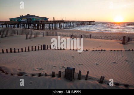 NC01689-00...NORTH CAROLINA - Sunrise at the Outer Banks Fishing Pier in the town of Nags Head on the Outer Banks. Stock Photo