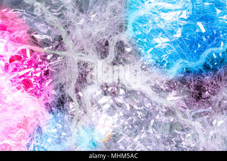 Abstract multicolored background with white threads. Fresh and cheerful texture with an atmosphere of celebration or party. Stock Photo